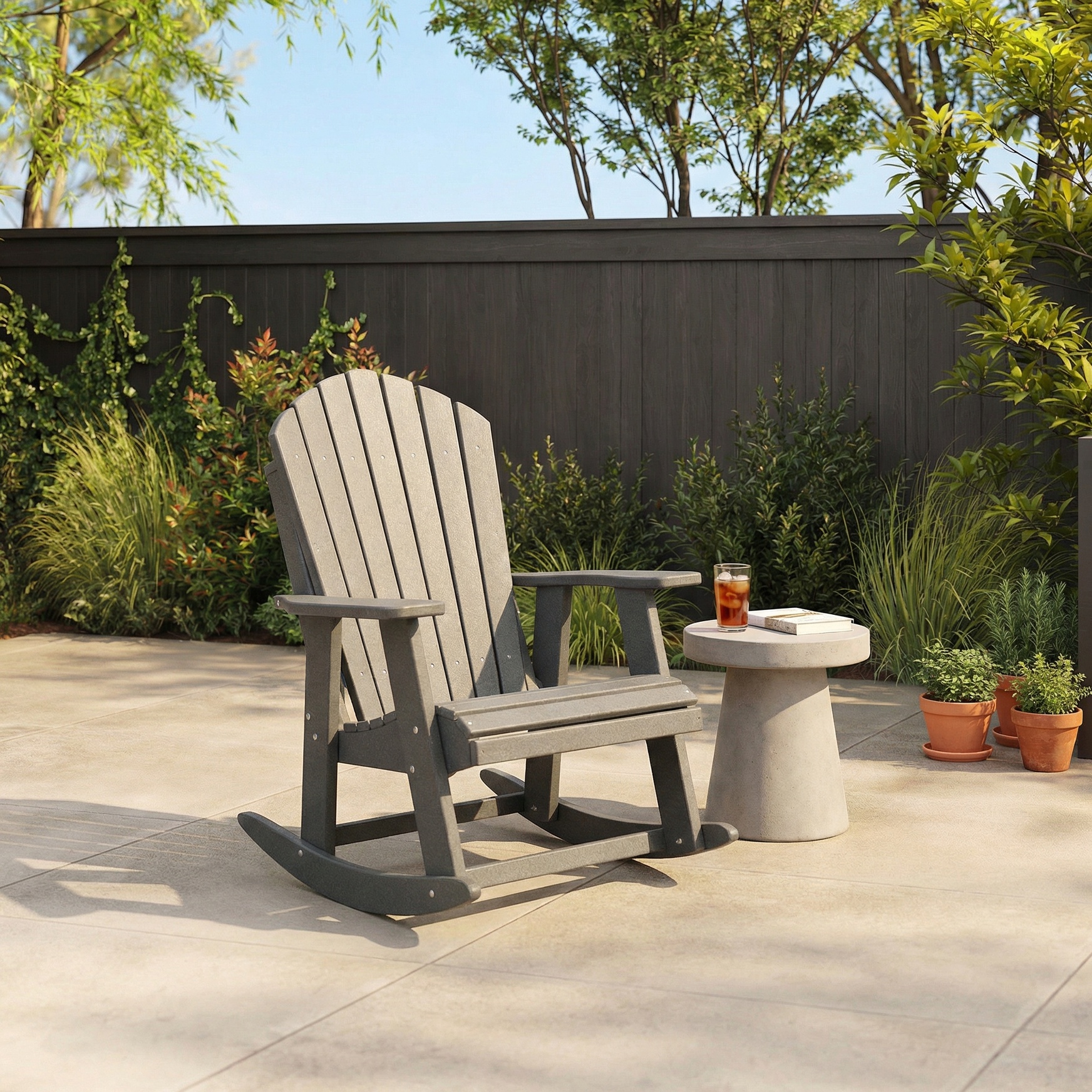 A green adirondack rocking chair.
