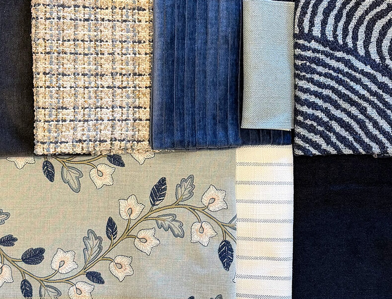 Fabric swatches with different patterns in the Blue, White and Gray 'Submerged' Color Scheme