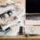 Home design planning with catalog and laptop.